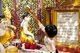 Burma / Myanmar: Bathing Buddha statues with water (a merit making act) in the Sutaungpyei Pagoda at the summit of Mandalay Hill, Mandalay